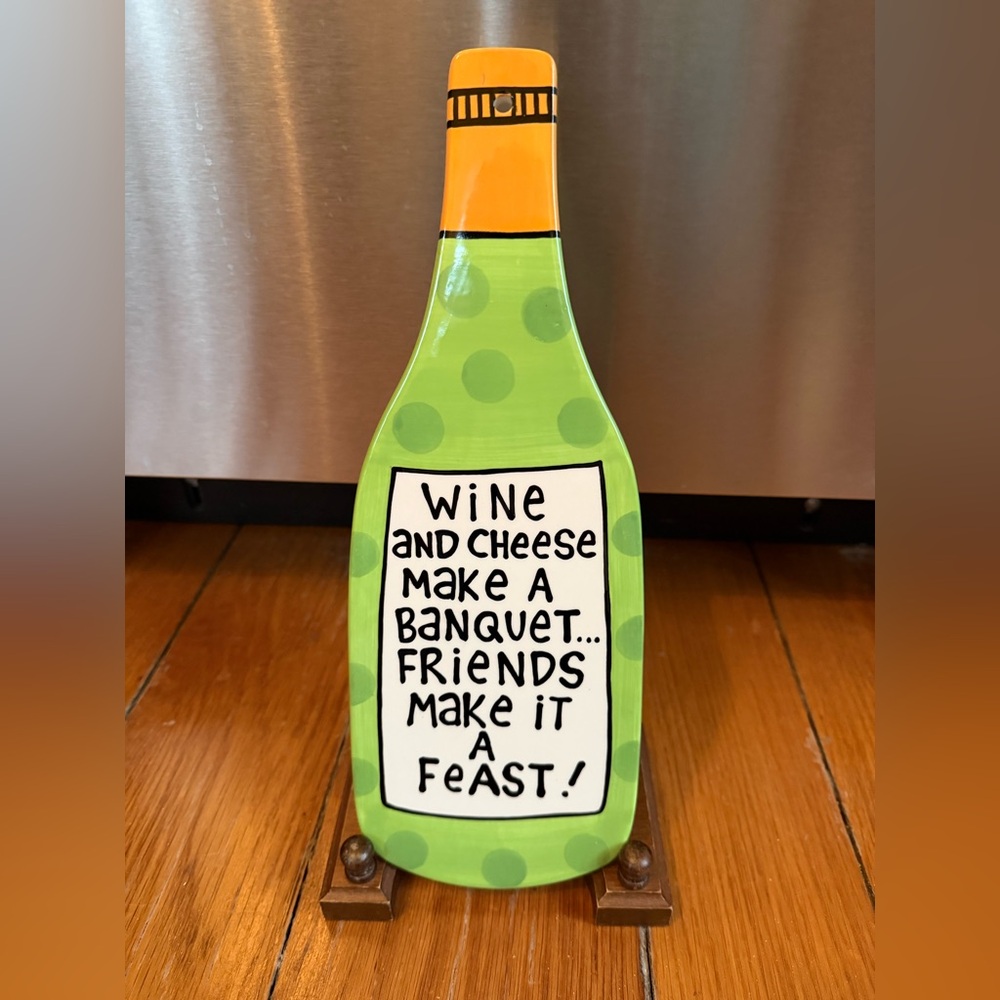Our name is Mud Laura Veasey Ceramic wine bottle shaped platter trivet